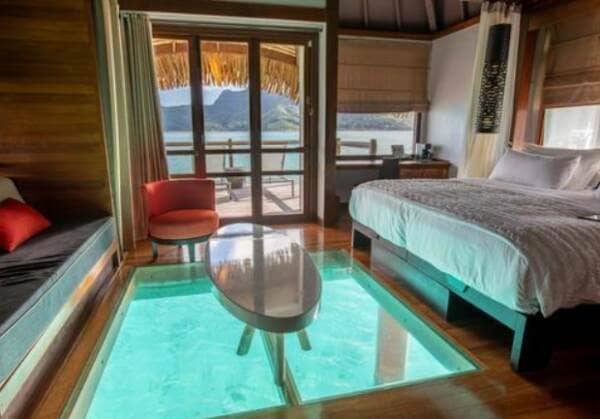 Elevated walkable glass Le Meridien Bora Bora bungalow suites